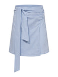 Changu Mini Wrap Skirt in ice blue | Melani Gibson Resort